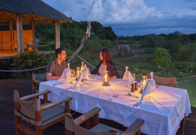 Gourmet safari dining and refreshing sundowner drinks served al fresco at Chikunto Safari Lodge