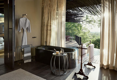 Chichele Presidential Lodge en-suite outdoor shower bathtub premium toiletries Zambia