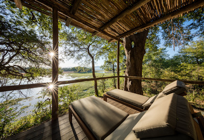 Relaxing outdoor lounge areas offering an exceptional armchair safari experience at Chindeni Bushcamp