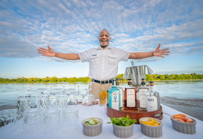 Gourmet dining experiences and exceptional culinary creations served on the scenic riverbank at Chinzombo Safari Camp