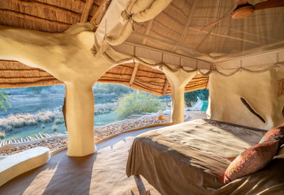 Chongwe River House large thatched bedroom locally sourced materials Lower Zambezi Zambia