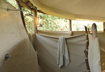 Open-air restaurant at Flatdogs Camp serving Zambian and international cuisine in South Luangwa