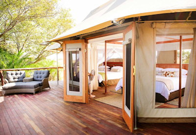 Ila Safari Lodge luxury tented suite private deck Kafue River views Zambia
