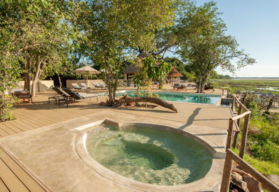 Kafunta River Lodge swimming pool only natural hot spring tub South Luangwa Zambia