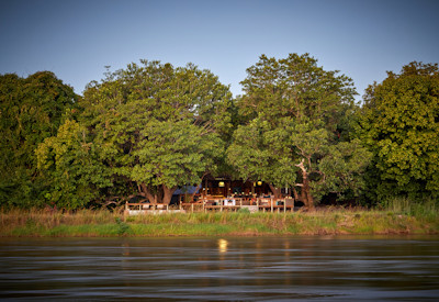 Kapamba Bushcamp luxury thatched chalets positioned to offer stunning views of the pristine river habitat