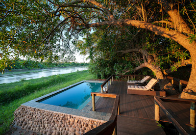 Attentive lodge staff providing premium hospitality and excellent guest service at Kapamba Bushcamp