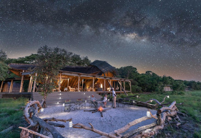 King Lewanika Lodge classic firepit evening drinks African stars Liuwa Plain Zambia