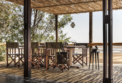Relaxing outdoor lounge spaces perfect for armchair safaris and bird watching at Kulandila Camp