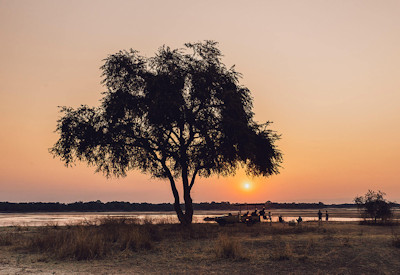 Spectacular African sunset over the Luangwa River viewed from the decks of Kulandila Camp