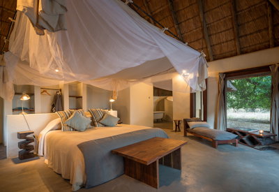 Luangwa River Camp thatched bush suite subtle décor mosquito netting Zambia