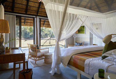 Wild elephants famously walking straight through the open reception lobby area at Mfuwe Lodge