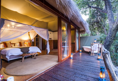 Mukambi Safari Lodge luxury tented suite open-air bathtub Kafue River views Zambia