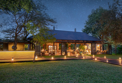Mukwa River Lodge heated lap pool River Lounge fireplace wine cellar fire pit Zambia