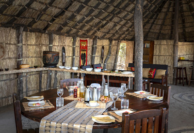 The central main lodge guest space offering panoramic 180-degree views of North Luangwa National Park at Mwaleshi Camp