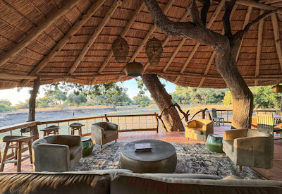 Mwamba Bush Camp sundowners termite mound South Luangwa National Park Zambia
