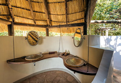 Expert guided walking safaris exploring the rich riverine woodlands and game trails near Nkwali Camp