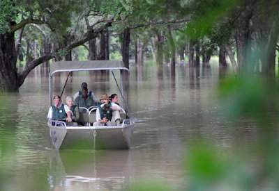 Delicious freshly prepared safari meals and scenic sundowner drinks enjoyed directly by the river at Nkwali Camp