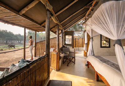 Old Mondoro classic tented safari suite floor-to-ceiling windows Zambezi views Zambia