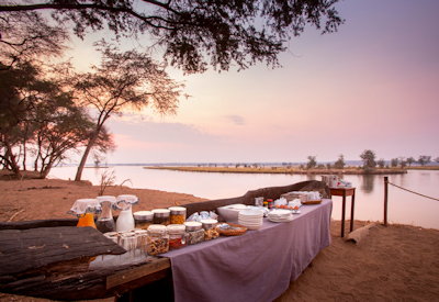 Old Mondoro outdoor dining tented open-fronted guest area Zambezi River Zambia