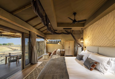 Puku Ridge Camp private waterhole suite views wildlife South Luangwa National Park Zambia