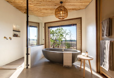 Puku Ridge Camp en-suite bathroom indoor outdoor shower South Luangwa National Park Zambia
