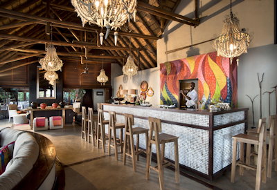 Royal Chundu Zambezi River Lodge lounge fireplace library bar Livingstone Zambia
