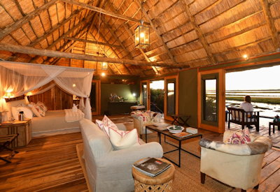 Royal Zambezi Lodge large thatched suite extra-length mattress down pillows Zambezi Zambia