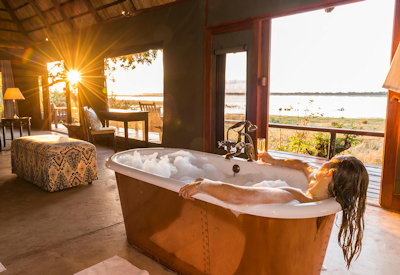 Royal Zambezi Lodge Presidential Suite freestanding copper bath outdoor shower Zambia