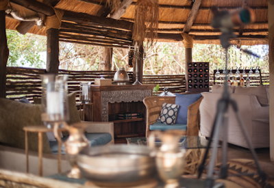 Sindabezi Island Camp thatched lounge swimming pool fire pit Zambezi Zambia