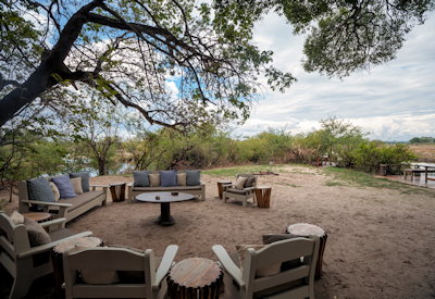 Sindabezi Island Camp five-star sandbank dining hurricane lamp stars Zambezi Zambia
