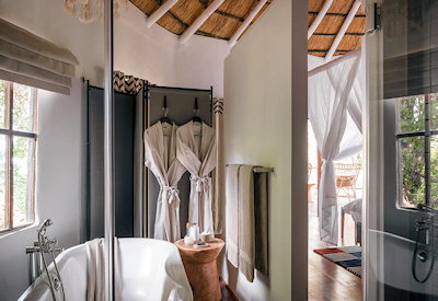 Sussi Chuma Lodge en-suite bathroom indoor outdoor shower bath Zambezi River Zambia
