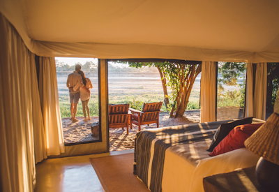 Tena Tena Camp luxury tented suite Persian rugs Bedouin cushions Luangwa River Zambia