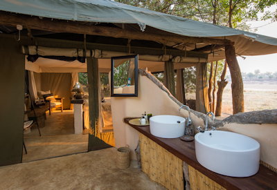 Tena Tena Camp outdoor shower overlooking waterhole elephants 30 yards Luangwa Zambia