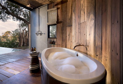 Thorntree River Lodge freestanding bathtub outdoor shower tented suite Zambia
