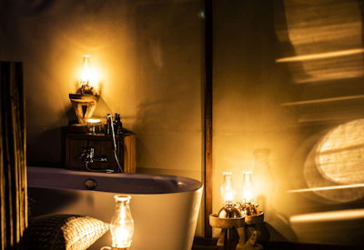 Toka Leya Camp en-suite bathtub double vanity Jackalberry Knobthorn canopy Zambia