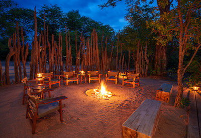 Spectacular African sunset over the floodplains and grasslands surrounding Zungulila Bushcamp