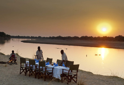 Sunset drinks snacks Luangwa River lagoon Tena Tena Camp Two Rivers Safari Zambia