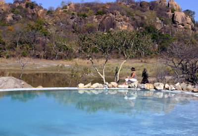 Amalinda Lodge infinity pool overlooking waterhole Matobo Hills UNESCO Zimbabwe
