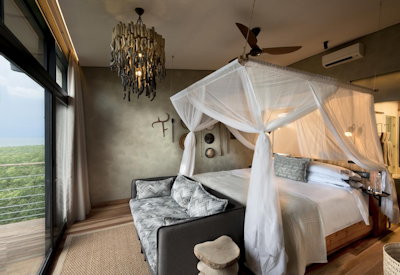 Bumi Hills Safari Lodge large intimate safari suite minibar safe air conditioning Zimbabwe