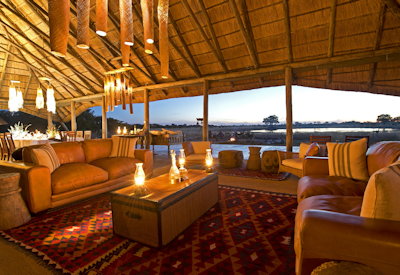 Camp Hwange thatched central area lounge library bar firepit Sinamatella Zimbabwe
