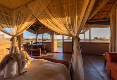 Camp Hwange chalet views waterhole Sinamatella concession Hwange National Park Zimbabwe