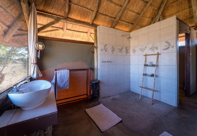 Camp Hwange en-suite bathroom indoor shower electronic safe Hwange Zimbabwe