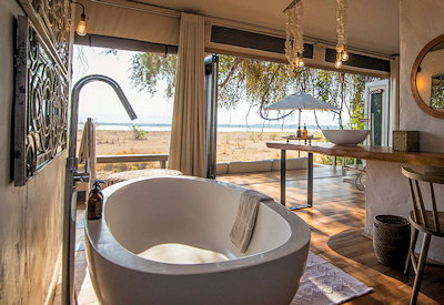 Chikwenya Camp freestanding bath incredible Zambezi River view Mana Pools Zimbabwe