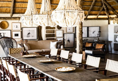 Chikwenya Camp tented indoor outdoor dining Zambezi River views Zimbabwe