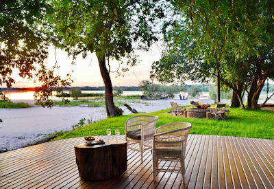 Chundu Island Lodge African sunset Zambezi River private island Zimbabwe