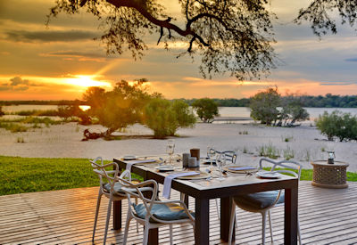Chundu Island Lodge alfresco dining Zambezi River banks Zimbabwe eco-friendly