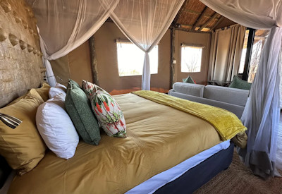 Daka Plains Camp luxurious tented suite private deck Deka River views Hwange Zimbabwe