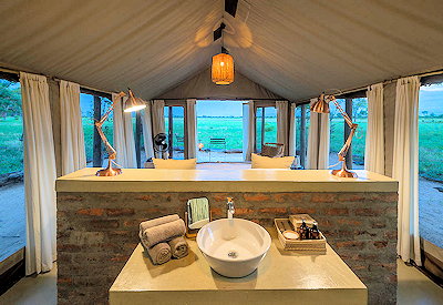 Davisons Camp roomy tented suite bedroom WiFi fan verandah Hwange Zimbabwe