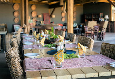 Davisons Camp canvas central area indoor outdoor dining firepit bar Hwange Zimbabwe