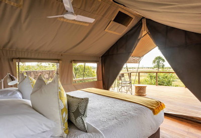 Deteema Springs Camp eco-luxury canvas tent elevated deck slope Hwange Zimbabwe